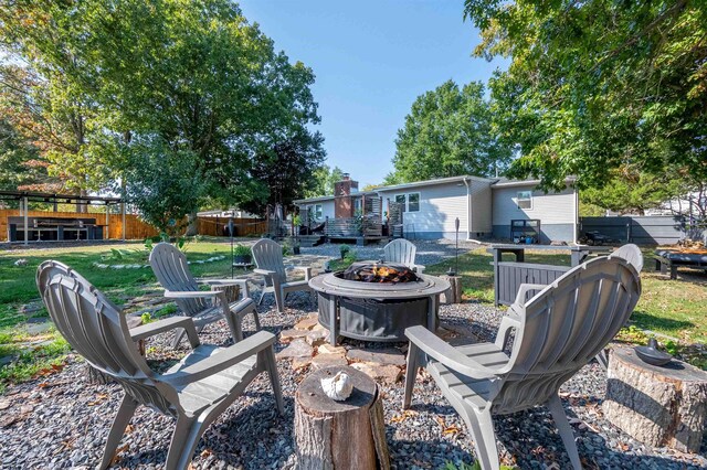 view of patio featuring an outdoor fire pit