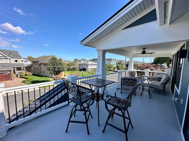 view of patio / terrace featuring ceiling fan