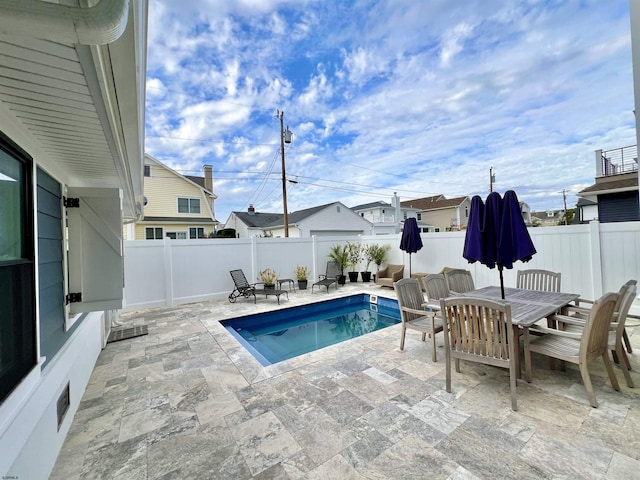 view of pool with a patio