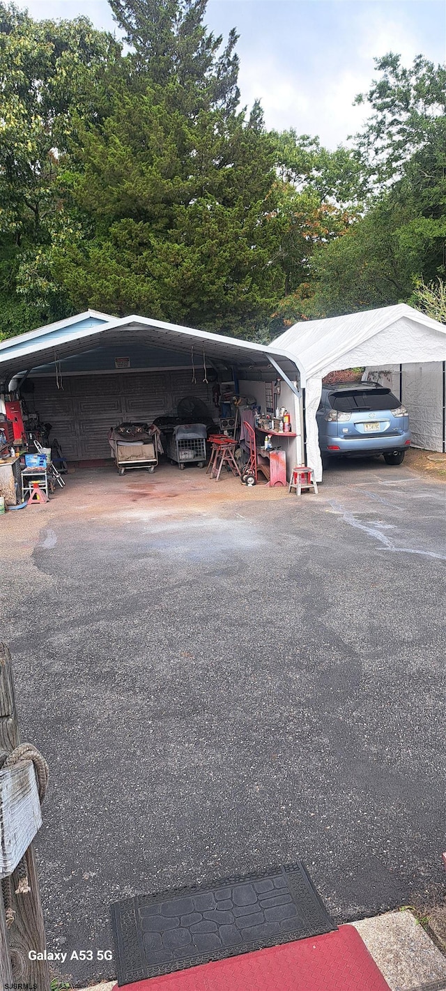 view of car parking with a carport