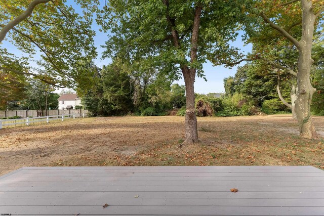 view of yard with a deck