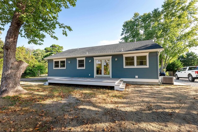 rear view of property with a deck