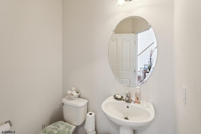 bathroom with sink and toilet