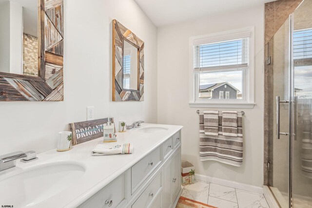 bathroom with vanity and walk in shower