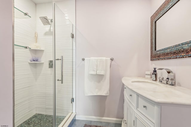 bathroom with vanity and an enclosed shower