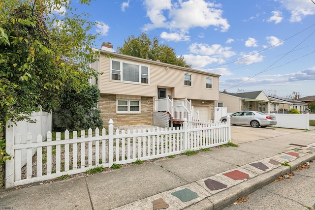 view of front of property featuring a garage