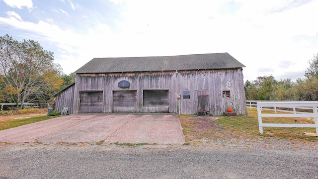 view of outdoor structure with a garage