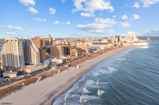 aerial view with a view of the beach and a water view