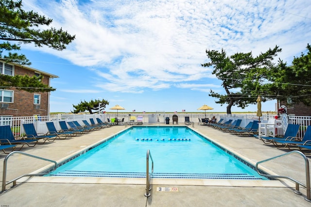 view of pool featuring a patio