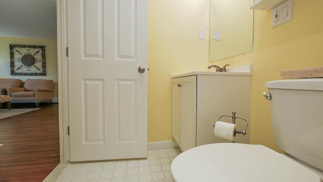 bathroom featuring toilet and hardwood / wood-style floors