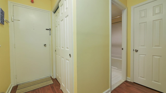 hall featuring dark hardwood / wood-style floors