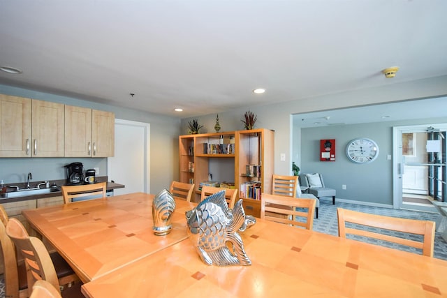 dining space featuring sink