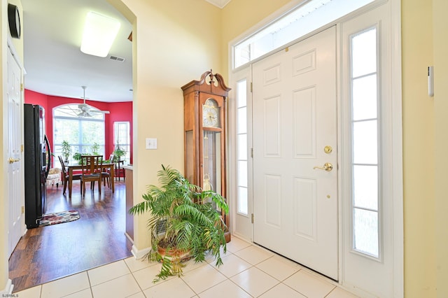 entrance foyer with light hardwood / wood-style floors and ceiling fan