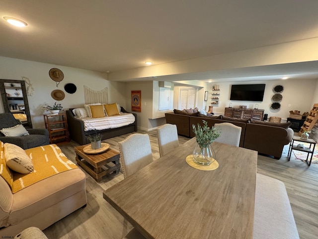 dining space featuring light hardwood / wood-style flooring