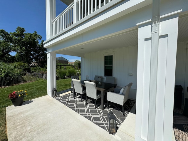 view of patio featuring a balcony