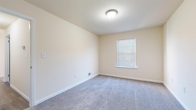 view of carpeted spare room