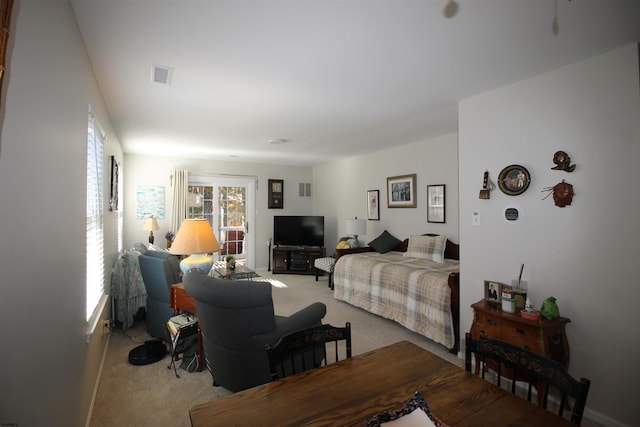 bedroom with light carpet