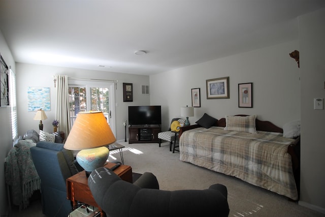 bedroom featuring carpet