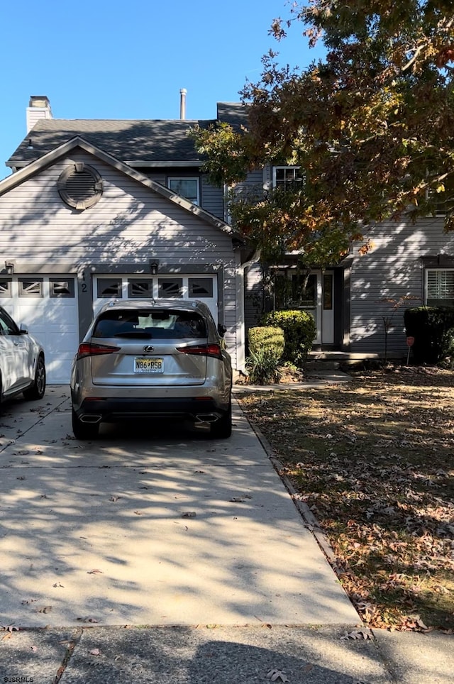 view of front of house with a garage