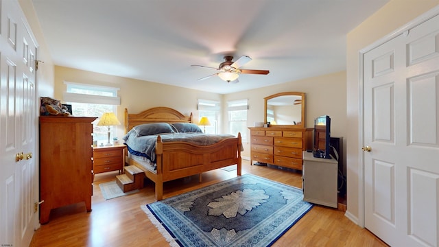 bedroom featuring ceiling fan and light wood-type flooring