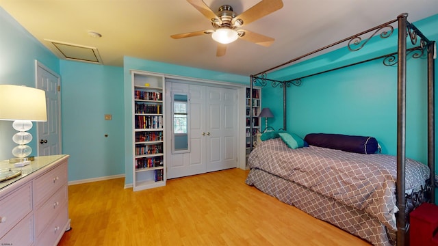 bedroom featuring light hardwood / wood-style floors, a closet, and ceiling fan