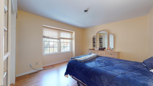 bedroom featuring light hardwood / wood-style flooring