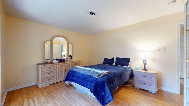 bedroom featuring light wood-type flooring