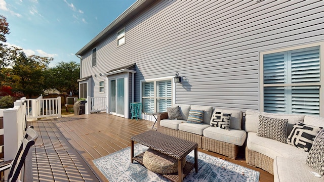 wooden deck with an outdoor hangout area