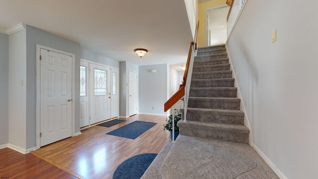 entrance foyer with hardwood / wood-style floors