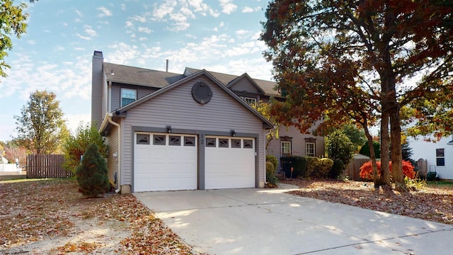 view of front of property with a garage