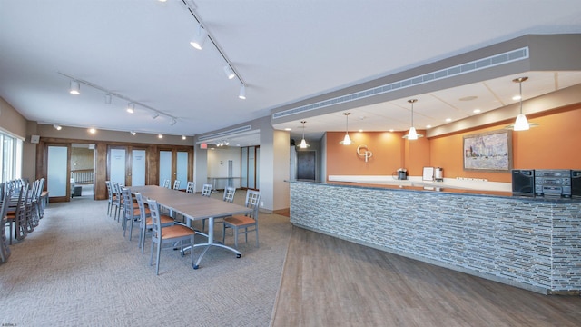 dining room featuring hardwood / wood-style flooring