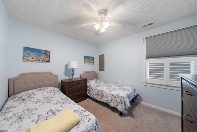 bedroom with light carpet, a textured ceiling, and ceiling fan