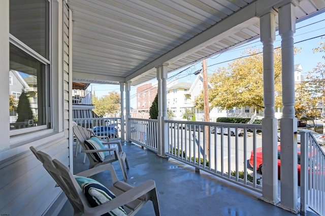 balcony featuring covered porch