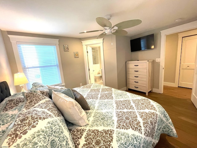 bedroom featuring ensuite bath, wood-type flooring, and ceiling fan