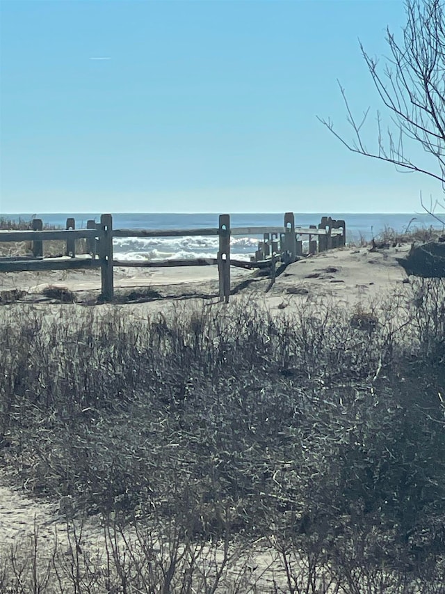 exterior space featuring a beach view