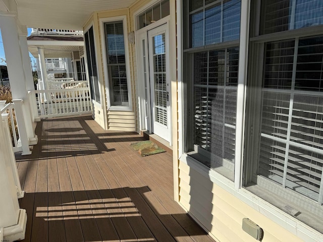 wooden deck featuring covered porch