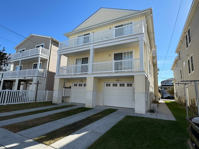 view of front facade featuring a balcony and a garage