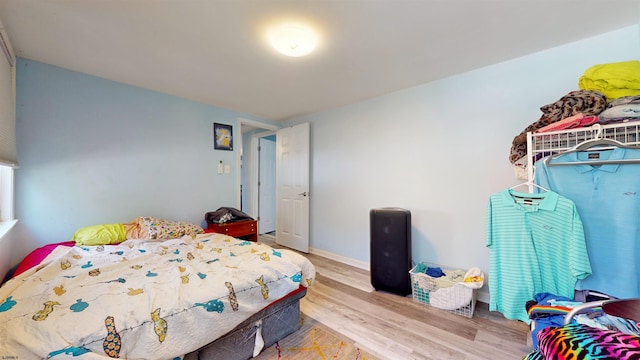 bedroom featuring light wood-type flooring