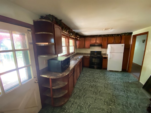 kitchen featuring black appliances and sink