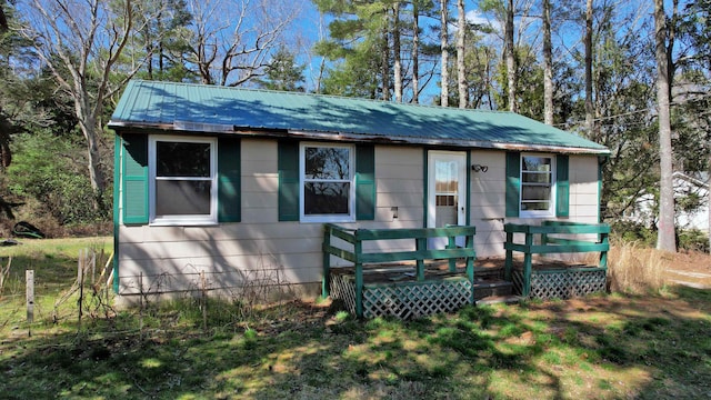 view of front of house with a deck