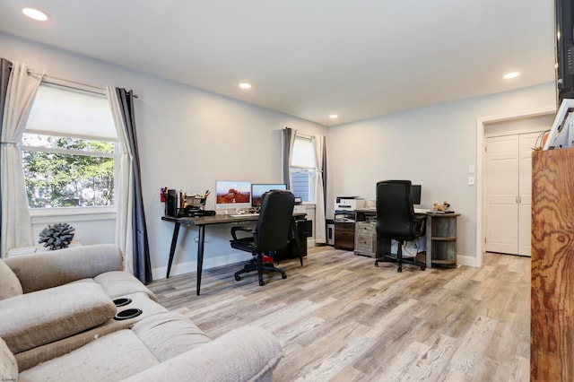 office space featuring light wood-type flooring