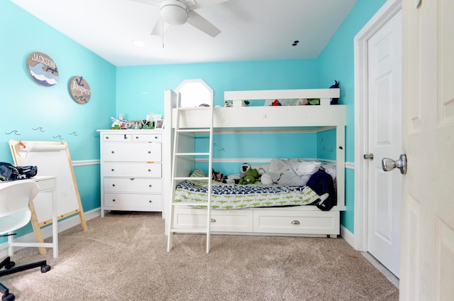 bedroom with light carpet and ceiling fan