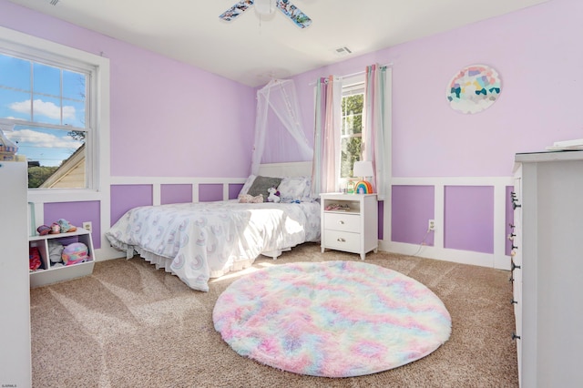 carpeted bedroom featuring ceiling fan