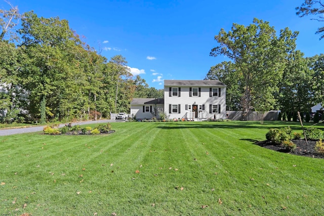 view of front of house with a front lawn