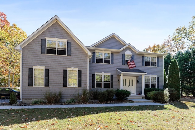 view of front of home featuring a front lawn