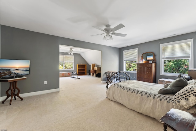 bedroom featuring lofted ceiling, carpet, and ceiling fan