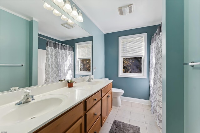 bathroom with vanity, ornamental molding, toilet, and tile patterned floors