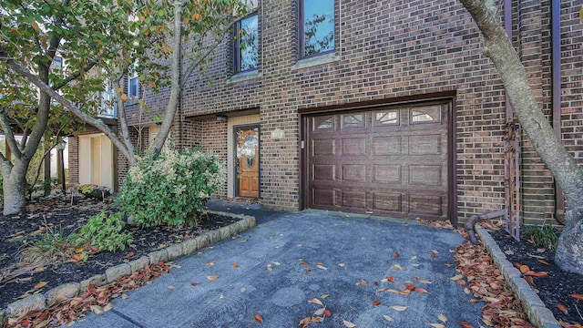 property entrance with a garage