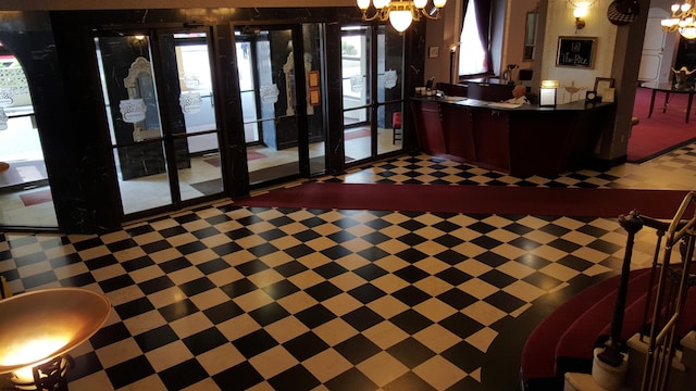 reception area with a notable chandelier