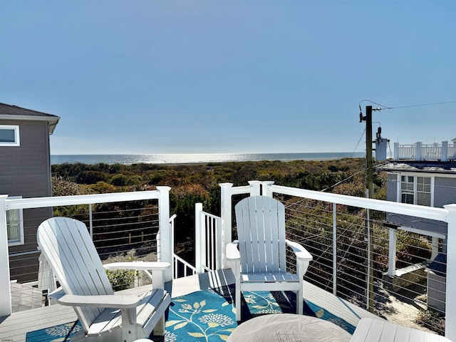 deck featuring a water view